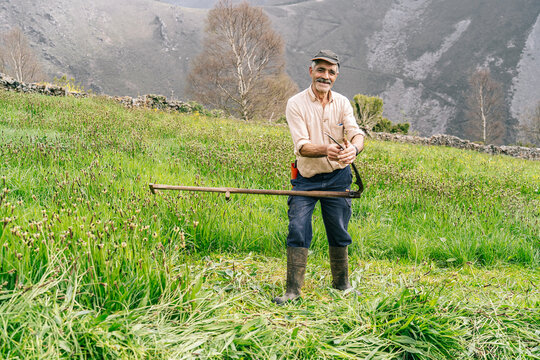 A farmer with the scythe