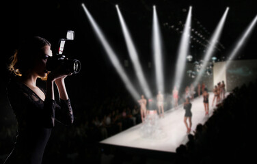 Photographer Press Woman use Camera to shoots Photo of Fashion Week Show which Model Supermodel...