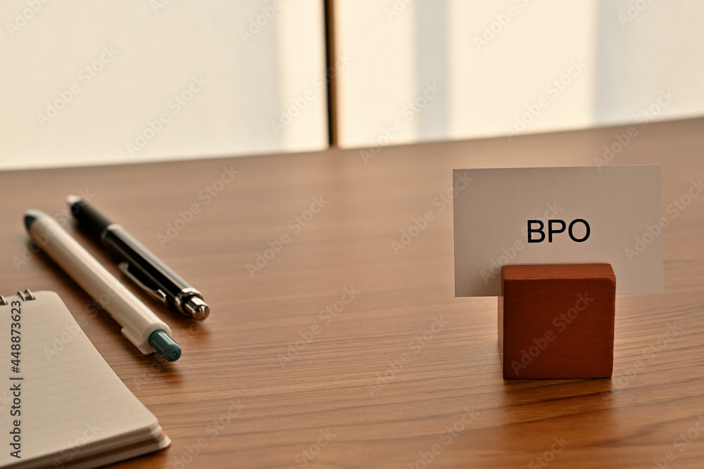 Poster there is a card on paper stand with the word of bpo which is an abbreviation for business process ou
