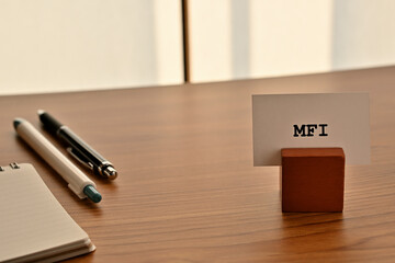 There is a card on paper stand with the word of MFI which is an abbreviation for Mobile First Index...