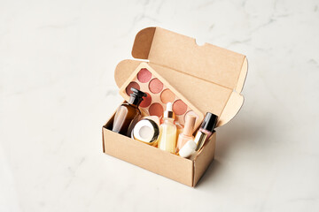 Beauty products miniatures in box.