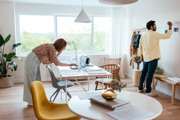 Diverse colleagues working in light workplace