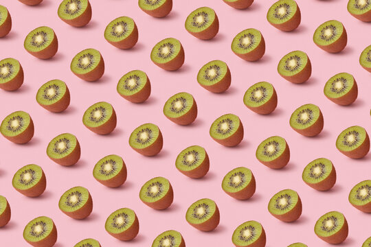Minimalistic pattern of tasty cut kiwi fruits