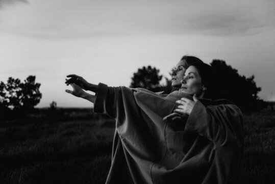 two women contemporary dancers dancing at dawn