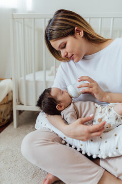Mother Feeding Her Baby