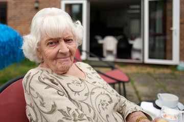 Relaxed portrait of an elderly lady