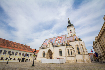 Church of Saint Mark, also called Crkva Svetog Marka, in the old Zagreb with its distinctive Croatia coat of arms made of tiles. Completed in the 13th century,It is a catholic landmark of Zagreb..... - obrazy, fototapety, plakaty