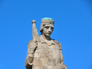 Fototapeta premium Military Cemetery in Riga. Close up of central sculpture 'Mother Latvia'. Sunny spring day