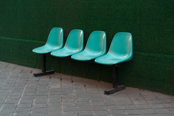 Chairs on the side of the street