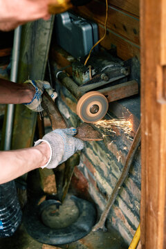Close up of man working with metal