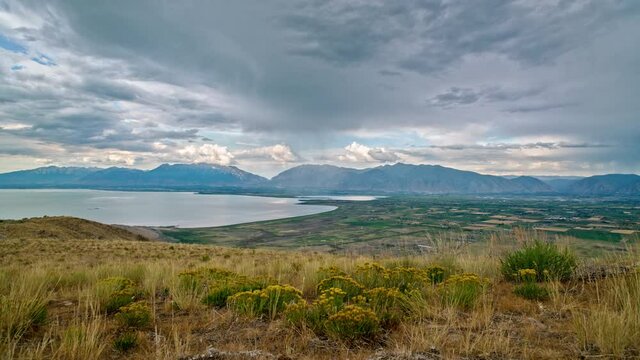 Time lapse of small rainstorm moving over Utah Valley in summer from West Mountain.