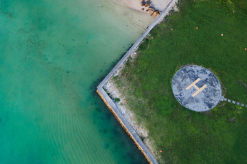 helipad top view, helicopter landing area on beach