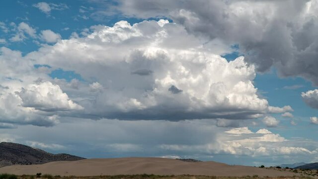 Timelapse of clouds building over the sand dunes at Little Sahara as summer monsoon storm makes its way in.
