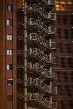 Facade of building with staircase and windows