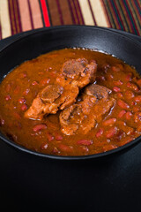 close up of a Traditional Guatemala Red Beans with pork meat