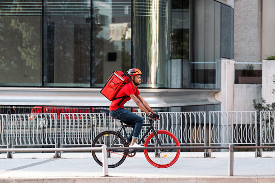 African Delivery Man Using Bike