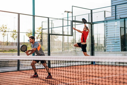 Men playing padel