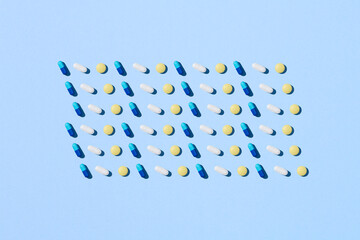 Creative layout with different colored pills