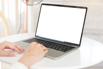 computer screen blank mockup.hand woman work using laptop with white background for advertising,contact business search information on desk at coffee shop.marketing and creative design