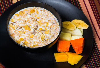 Fiber cereal served with milk and fruit