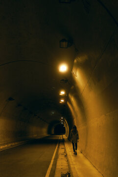 Girl Alone Walking Tunnel At Night