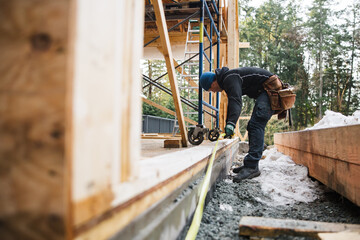 Man working construction in winter