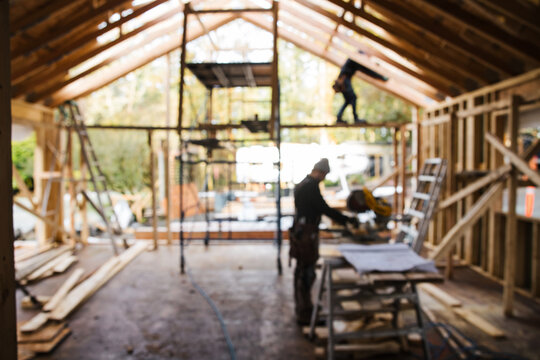 Blurry Construction Carpenters In Building