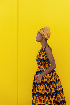 Young African woman in ornamental clothes