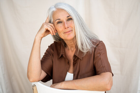 Fashion portrait of confident beautiful mature woman 