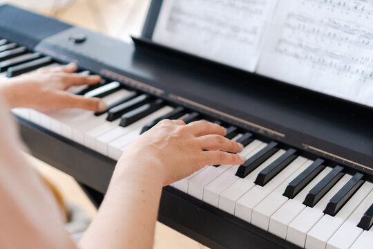 Pianist Hands On Musical Keyboard