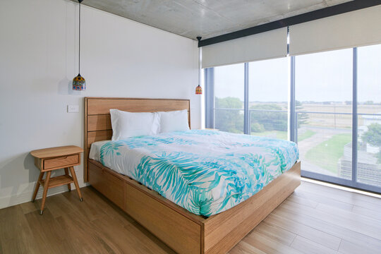 Bedroom interior with Aqua color styling and ocean front views