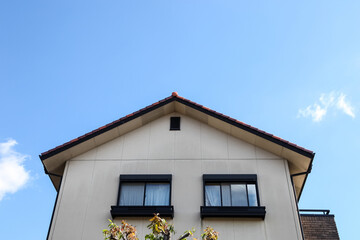 perfectly suburban house on a beautiful sunny day.