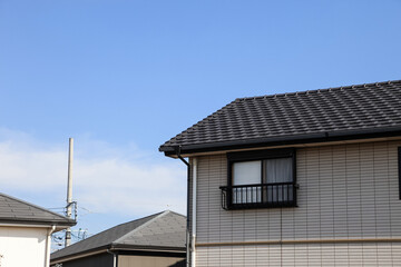 perfectly suburban house on a beautiful sunny day.