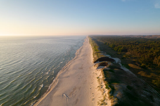 Aerial View Of Coastline At Sunset