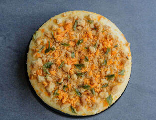 Delicious homemade pastry. Salted Egg Cheese Cake. Ingredients cheese, sour cream, cream cheese, walnut cookies, curry leaves and salted egg yolk only