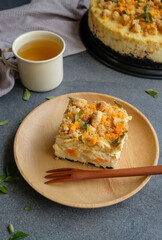 Delicious homemade pastry. Salted Egg Cheese Cake. Ingredients cheese, sour cream, cream cheese, walnut cookies, curry leaves and salted egg yolk only