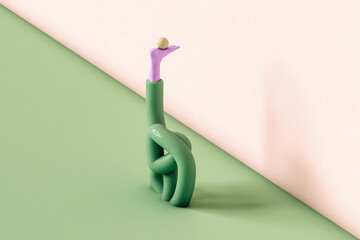 Abstract leg doing yoga on a green and pink background