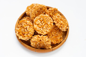 Rice cracker with coconut palm sugar on white