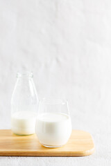 glass of milk and bottle of milk