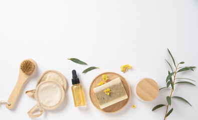 Flat lay beauty spa  with natural cosmetic products peeling natural soap, sponges, oil  and massage brushes. Eco-friendly and zero waste concept. Top view and copy space