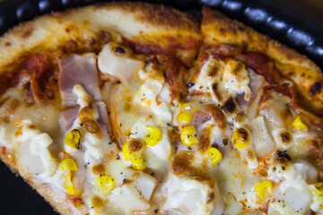 Slice of fresh Pizza with Sausage.