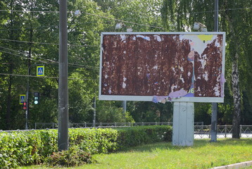 Old empty rusty billboard on the street, ulitsa Sedova, St. Petersburg, Russia, August 2021