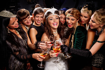 Beautiful women in evening dresses with champagne glasses - Powered by Adobe