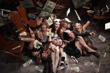 Beautiful women  in the rain of money