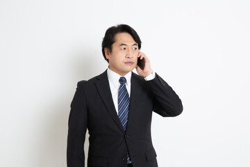 中年のサラリーマン日本人男性