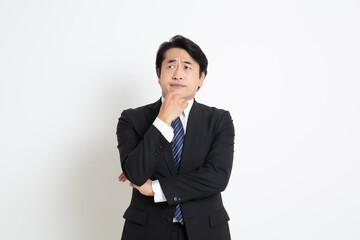 中年のサラリーマン日本人男性