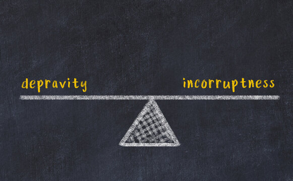 Chalk drawing of scales with words depravity and incorruptness. Concept of balance