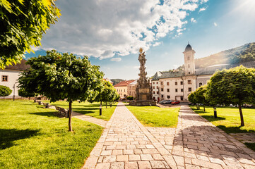 Historical town square in mining city Kremnica in Slovakia. The outlook to castle and St. Catherine...