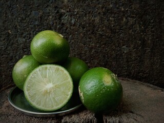 Group of fresh lemon on an old vintage wooden table