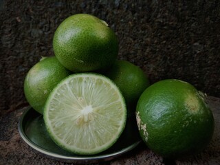 Group of fresh lemon on an old vintage wooden table